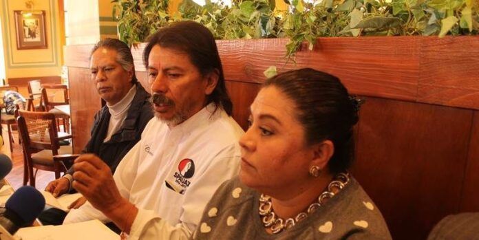 Dirigencia sindical en rueda de prensa