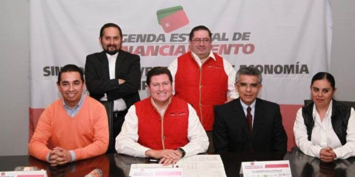 Alfonso Bonilla con su equipo y representantes de Nafin Alfonso Bonilla con su equipo y representantes de Nafin