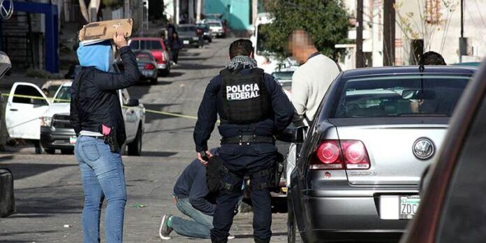 Le disparan frente a taller