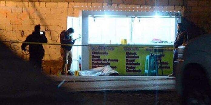 Cuerpo queda junto a puesto de comida