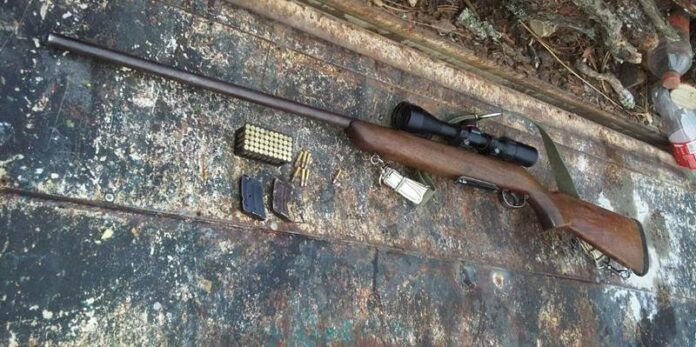 Traía rifle calibre 22 Traía rifle calibre 22